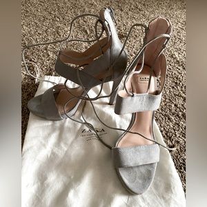 Zara (baby grey) heels with strings and zip.